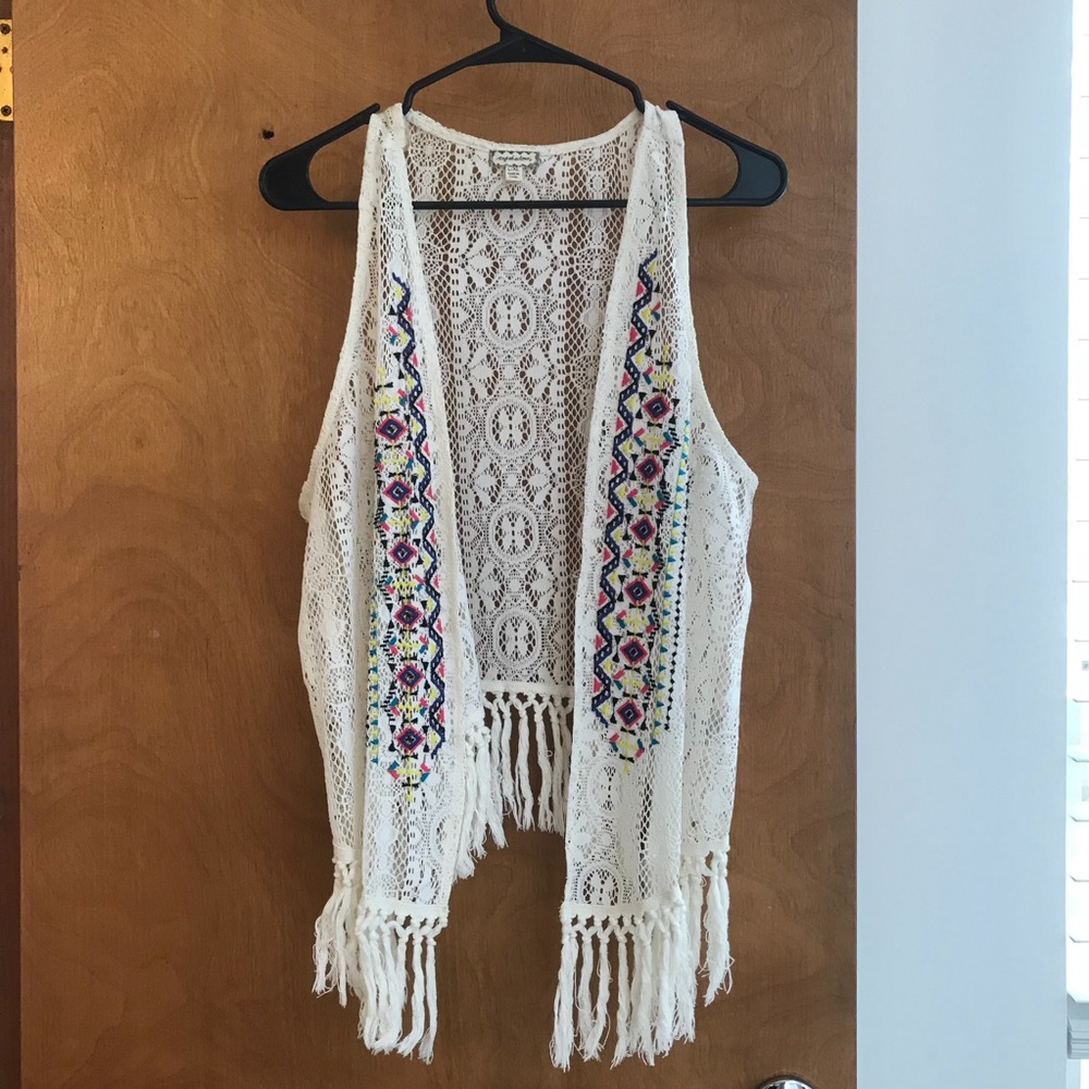 Cream colored vest
